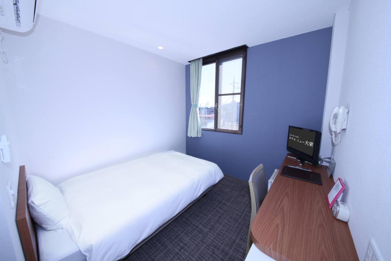 Business Hotel New Daiei Асікаґа Екстер'єр фото
